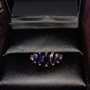 10 Kt Gold Graduated Marquis Cut 5 Stone Sapphire ring with diamond chips